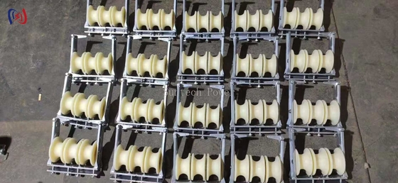 Dengan efisien menarik tiga bundel kawat cross-section kecil dengan konduktor stringing blok